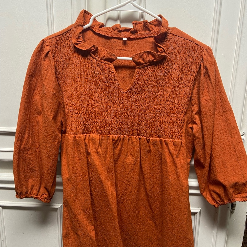 Chic Orange Ruffled Blouse